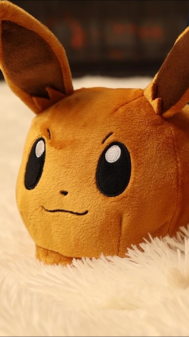 Stay cozy and show off your love for Pokémon with these adorable Eevee Adult Slippers. Perfect for lounging around, these slippers add a playful touch to your casual wear.